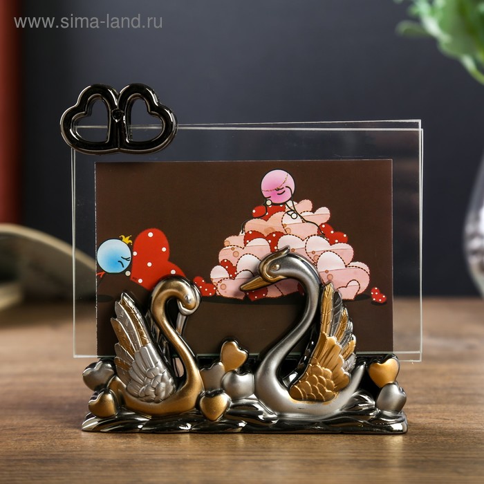 Фоторамка пластик 10х15 см "Лебеди и сердца" 14х15х3,7 см
Фоторамка пластик 10х15 см "Лебеди и сердца" 14х15х3,7 см