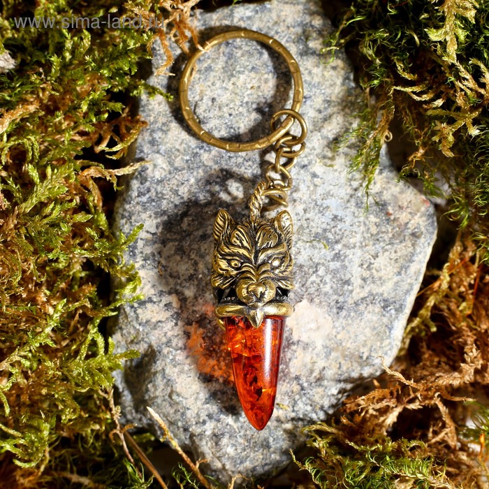 Брелок из латуни и янтаря "Клык волка" маленький 2х5 см
Брелок из латуни и янтаря "Клык волка" маленький 2х5 см