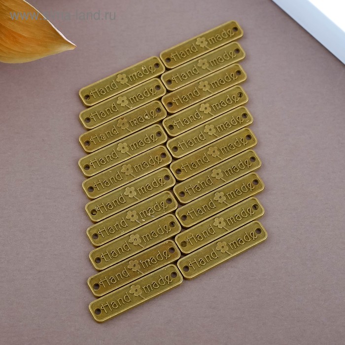 Декоративный элемент "handmade" цвет бронза 2,5х0,6 см
Декоративный элемент "handmade" цвет бронза 2,5х0,6 см