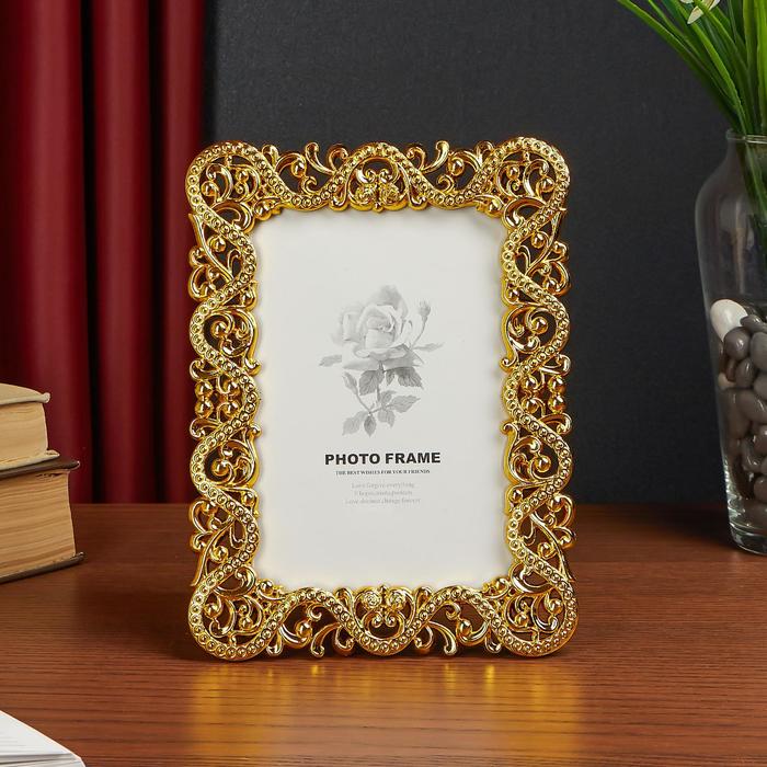 Фоторамка пластик 10х15 см "Витиеватость" золото 19,3х14,2х1,5 см
Фоторамка пластик 10х15 см "Витиеватость" золото 19,3х14,2х1,5 см