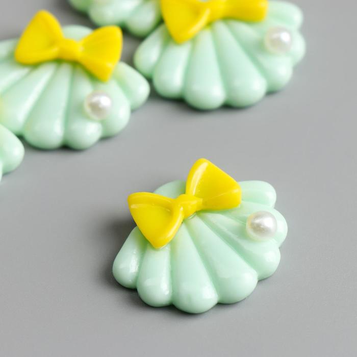 Декор для творчества пластик "Ракушка с бантиком и жемчужиной" 2,4х2,8 см
Декор для творчества пластик "Ракушка с бантиком и жемчужиной" 2,4х2,8 см