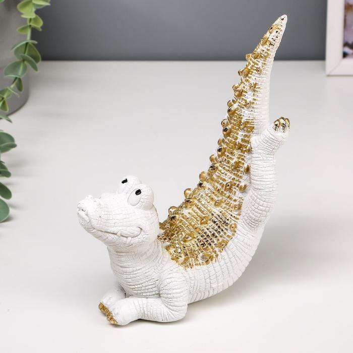 Сувенир полистоун "Бело-золотой крокодил, лежит на пузе" 19,5х14,5х7,5 см
Сувенир полистоун "Бело-золотой крокодил, лежит на пузе" 19,5х14,5х7,5 см