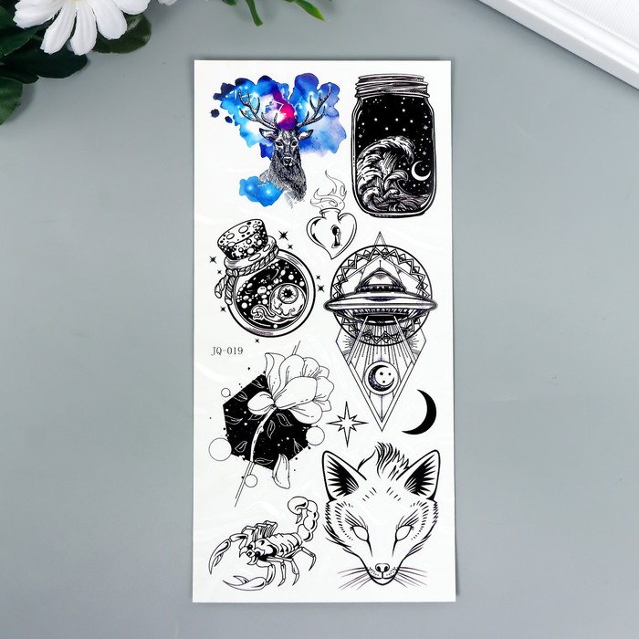 Татуировка на тело чёрная с цветом "Звёздное небо и животные" 19х9 см
Татуировка на тело чёрная с цветом "Звёздное небо и животные" 19х9 см