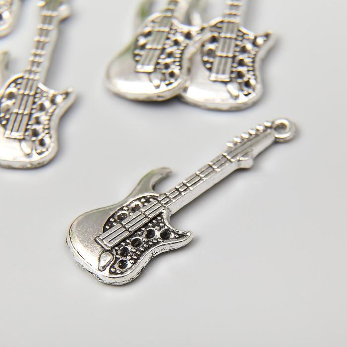 Декор металл для творчества "Электрогитара" серебро 3,5х1,3 см
Декор металл для творчества "Электрогитара" серебро 3,5х1,3 см