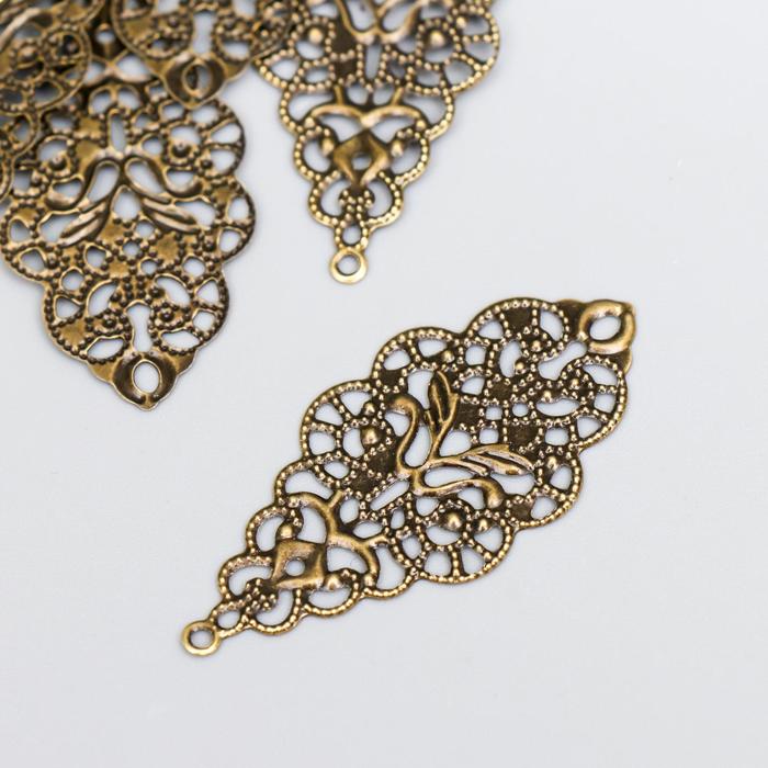 Декоративный элемент 4,3х2 см цвет бронза 
Декоративный элемент 4,3х2 см цвет бронза