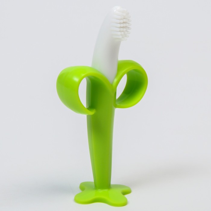 фото Детская зубная щетка, прорезыватель - массажер на присоске «банан», силиконовая, с ограничителем, в контейнере, цвет зеленый крошка я