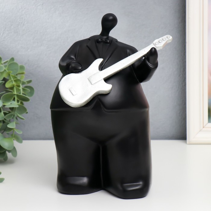 Сувенир полистоун "Толстячок-музыкант с гитарой" чёрный 23х14х16,5 см
Сувенир полистоун "Толстячок-музыкант с гитарой" чёрный 23х14х16,5 см
