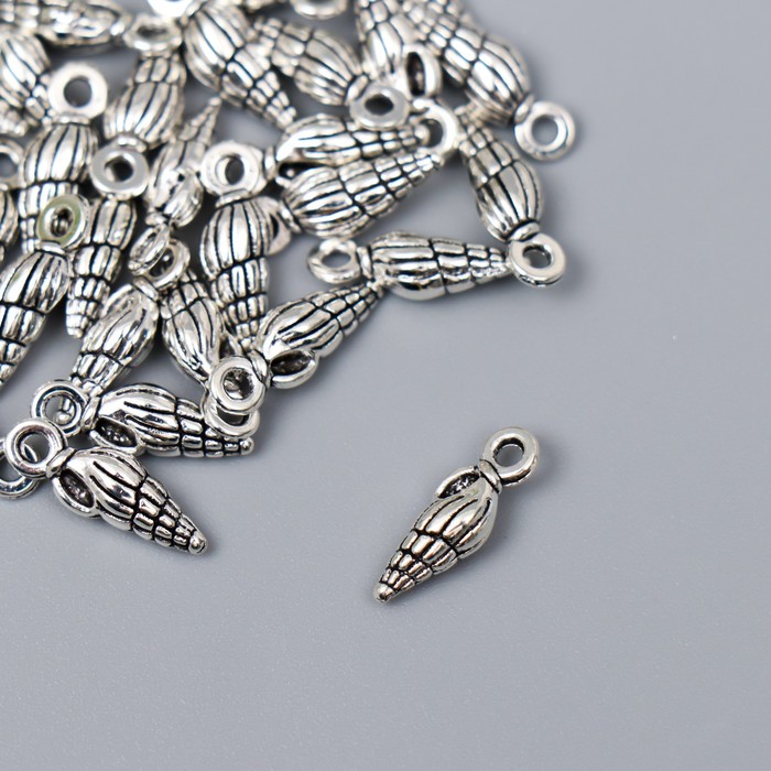 Декор металл для творчества "Ракушка веретено" серебро G051B1021 набор 30 шт 1,4х0,4 см 
Декор металл для творчества "Ракушка веретено" серебро G051B1021 набор 30 шт 1,4х0,4 см