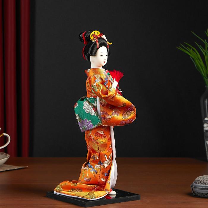 фото Кукла коллекционная "гейша в оранжевом кимоно с веером" 22,5 см