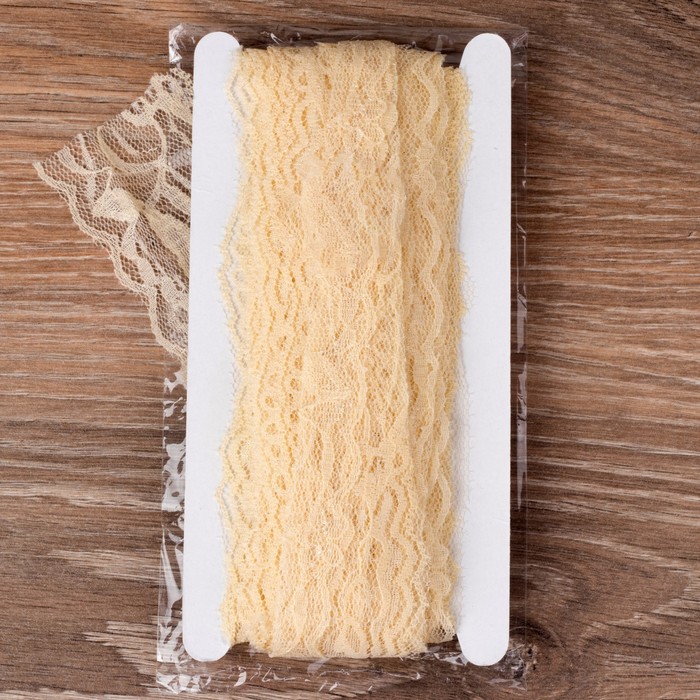 Кружево эластичное, ширина 55мм, 10±1м, цвет молочный