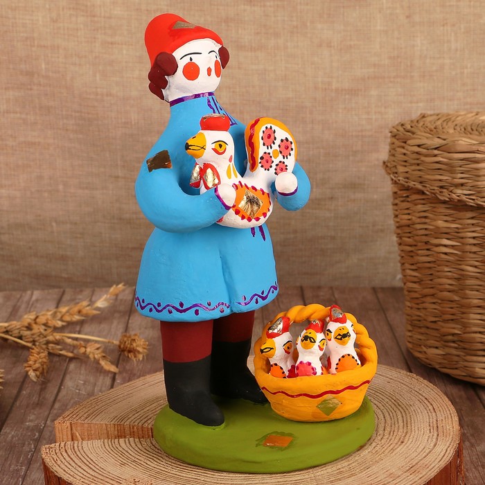 Дымковская игрушка "Мужик стоячий с уткой и утятами"