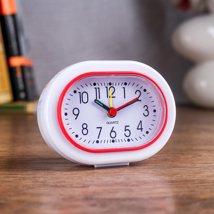 Будильник овал бел циферблат, кант цвет, подсветка,стрелки светятся микс 7,5*10см
