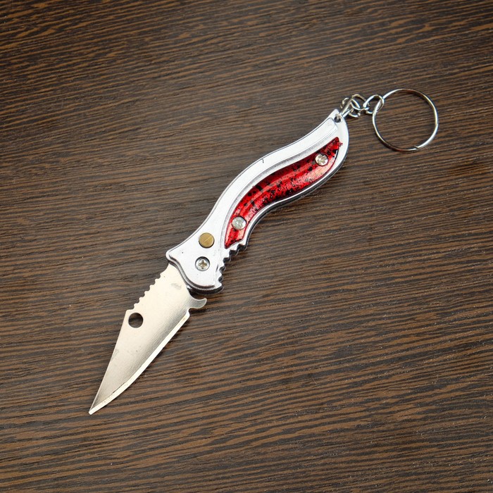 фото Нож складной с кнопкой, рукоять тигровый окрас, микс