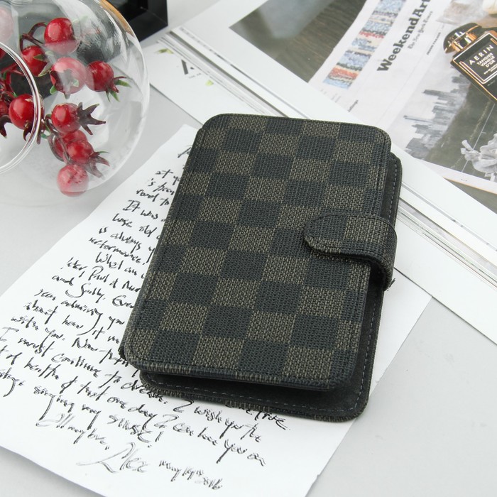 Чехол-книжка "Norton" для телефона универсальный, 5,2"-5,5", с выдвижным механизмом, цвет чёрный/коричневый