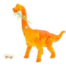 Динозавр «Травоядный», работает от батареек, откладывает яйца, с проектором, в пакете