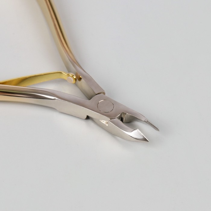 Кусачки маникюрные, одинарная пружина, 9,5см, рабочая область-4мм, цвет золотой/серебристый
