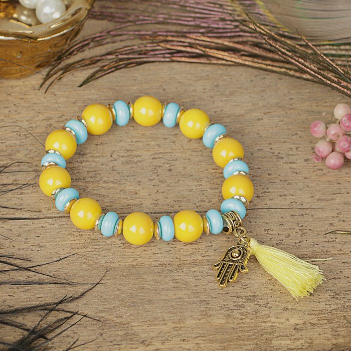 Браслет пластик "Бусины" рука хамса, цвет жёлто-голубой