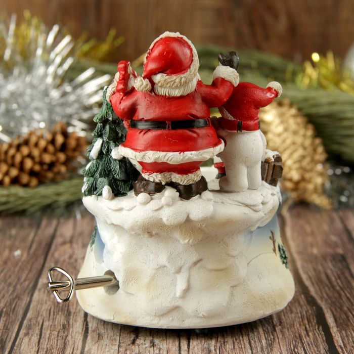 Сувенир полистоун "Детишки на катке с Дедом Морозом и снеговиком" музык. 13,5х10,5х11 см