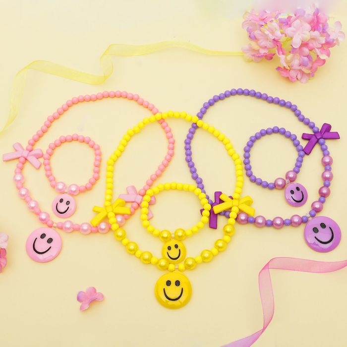 Набор детский "Выбражулька" 2 предмета: кулон, браслет, смайл с бантиками, цвет МИКС