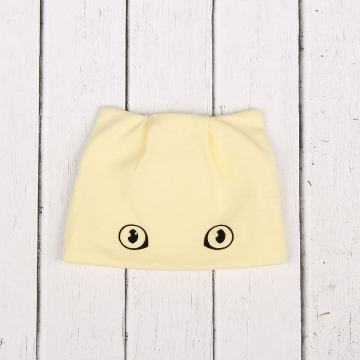Шапочка трикотажная для куклы с ушками светло-жёлтая