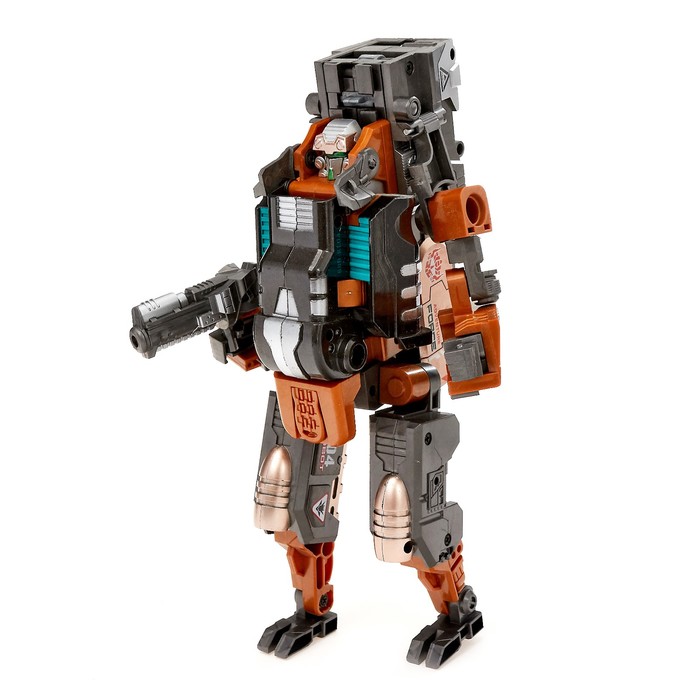 Робот-трансформер "Кибербластер", трансформируется в пистолет и стреляет мягкими пулями