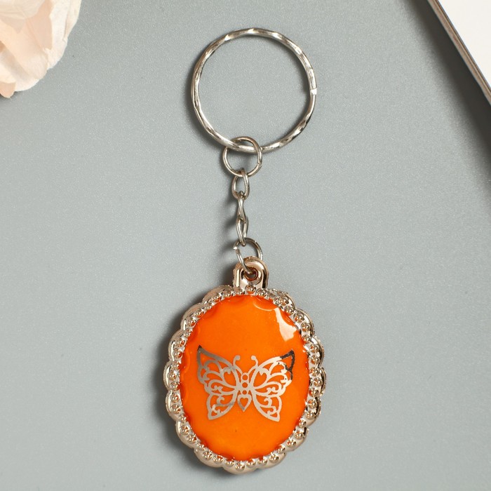 Брелок пластик под металл "Бабочка в овале" МИКС 4,2х3 см