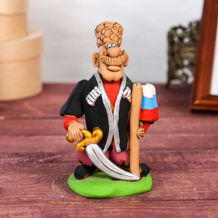 Статуэтка "Казак с саблей и флагом"