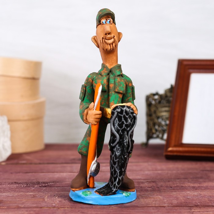 Статуэтка "Рыбак с сомом"