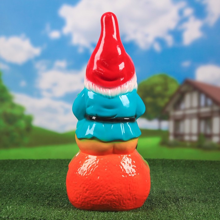 Садовая фигура "Гном на апельсине"