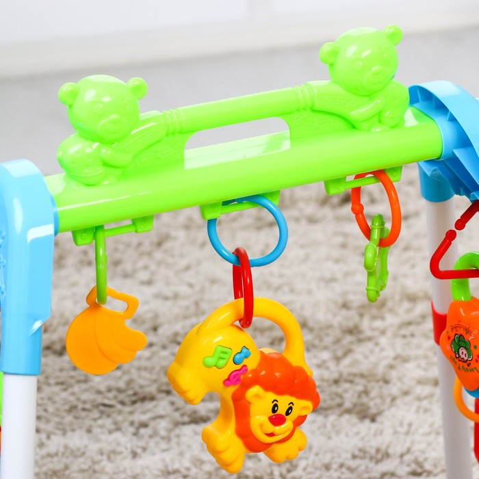 Игровой развивающий центр-турник с погремушками «Львёнок»