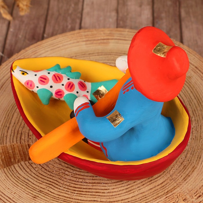 Дымковская игрушка "Ммужик в лодке"