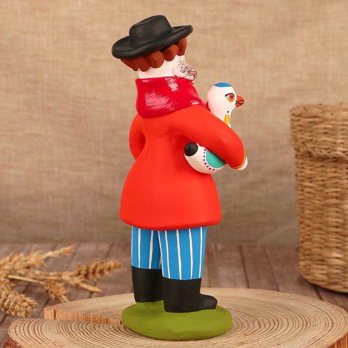 Дымковская игрушка "Старик с гусём"