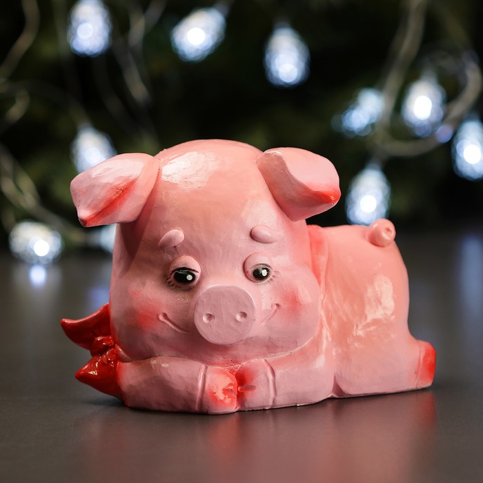 Копилка "Поросенок лежачий с бантом малый"12х17см розовый