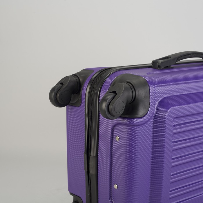 Чемодан малый "Сдвиг" 20", отдел на молнии, кодовый замок, 4 колеса, цвет фиолетовый