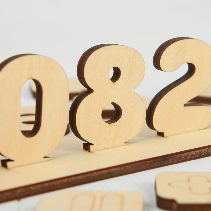 Развивающая игра "Цифры на подставке"