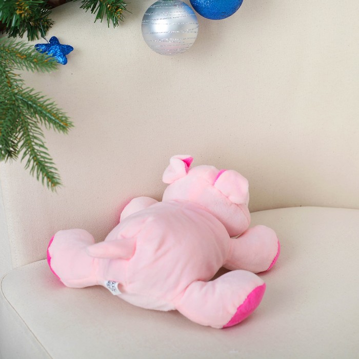 Мягкая музыкальная игрушка "Хрюшка" лежит