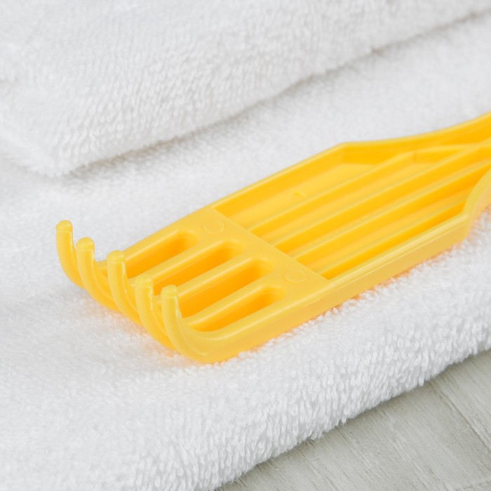 Чесалка универсальная с массажёром