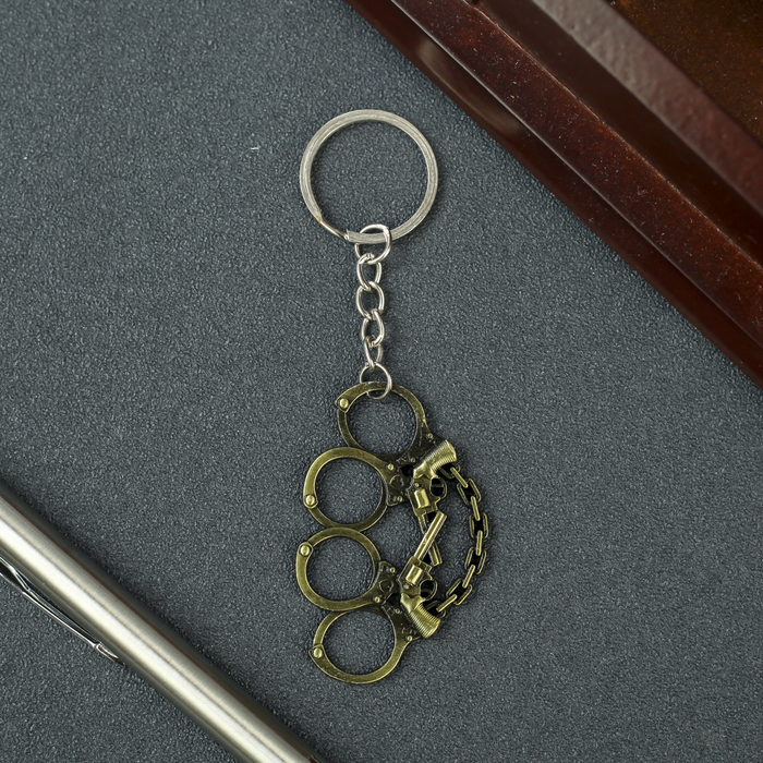 Брелок металл "Кастет" бронза 4х3х0,2 см