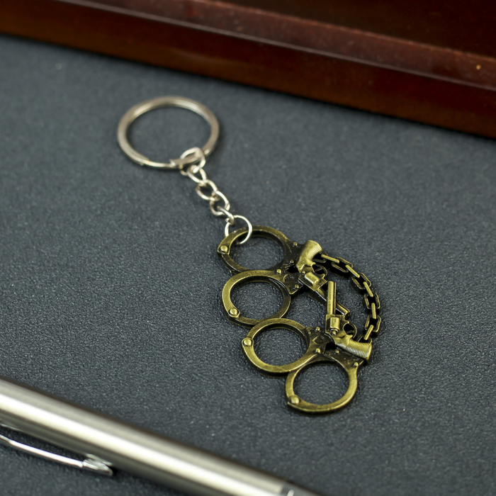 Брелок металл "Кастет" бронза 4х3х0,2 см