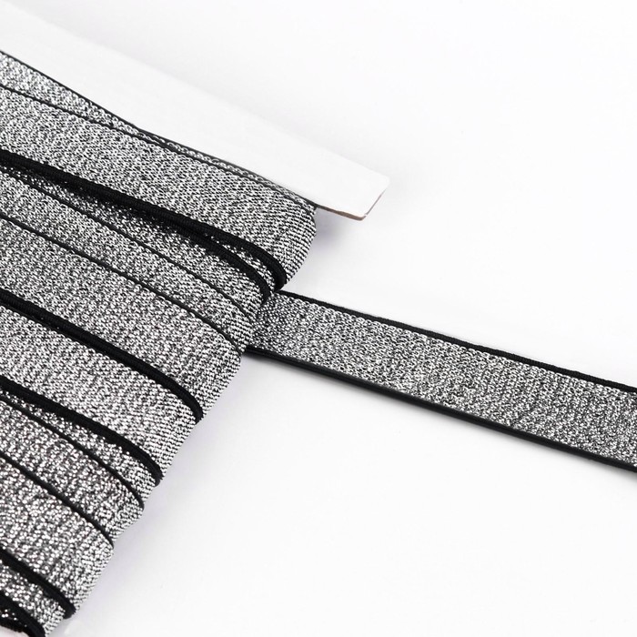 фото Резинка с глиттером, 15 мм, 10 ± 1 м, цвет чёрный/серебряный арт узор
