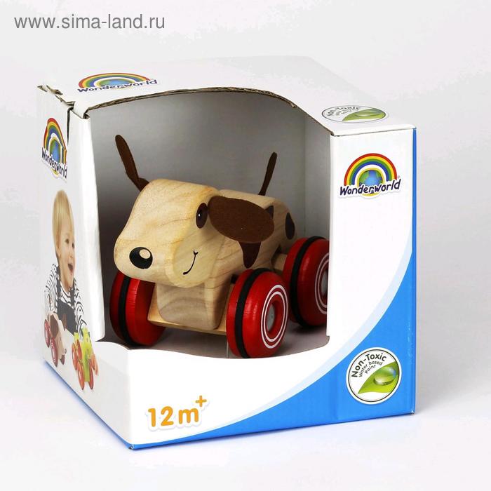 фото Деревянная игрушка на колесах «щенок» wonderworld
