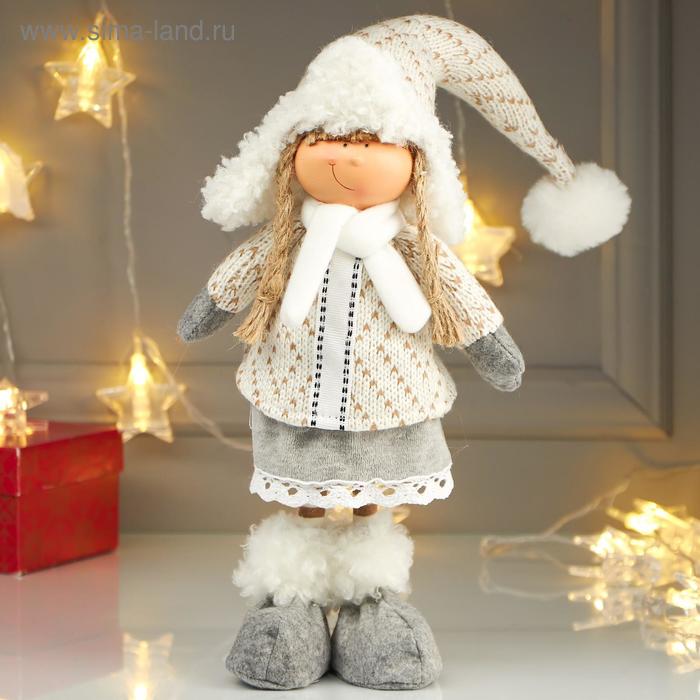 Кукла интерьерная Девочка в зимнем наряде и в шапке-ушанке 52х10х15 см