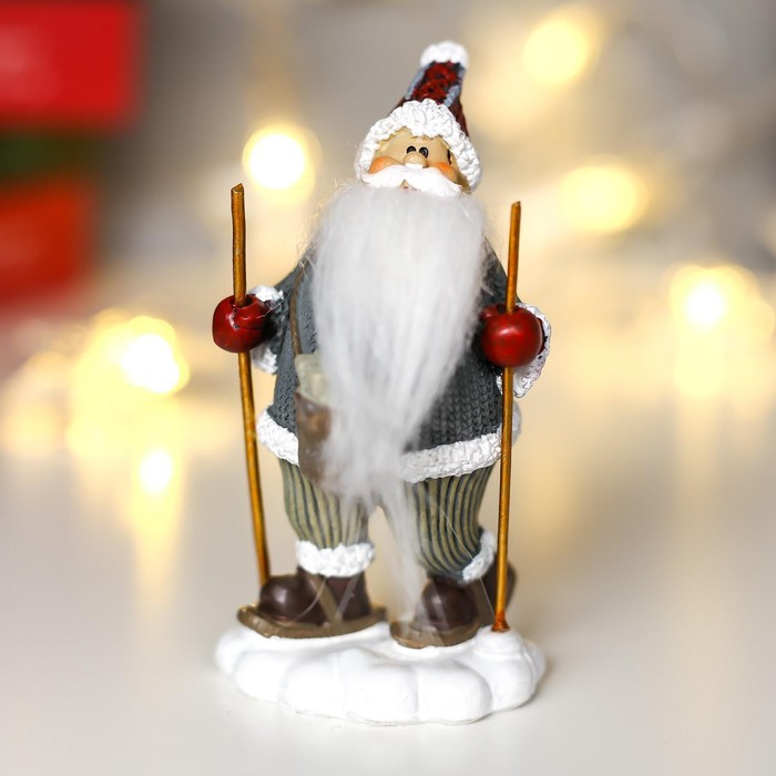 цена Сувенир полистоун Дед Мороз с длинной бородой, на лыжах 10,5х5,5х4 см