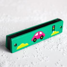 

Губная гармошка в коробке с песнями