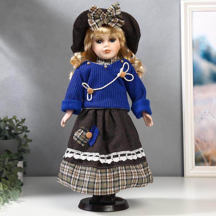 Кукла коллекционная керамика "Блондинка с кудрями, синий свитер с цветком" 40 см