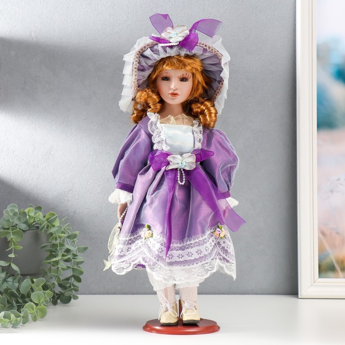 цена Кукла коллекционная керамика Малышка Лида в фиолетовом платьице 40 см