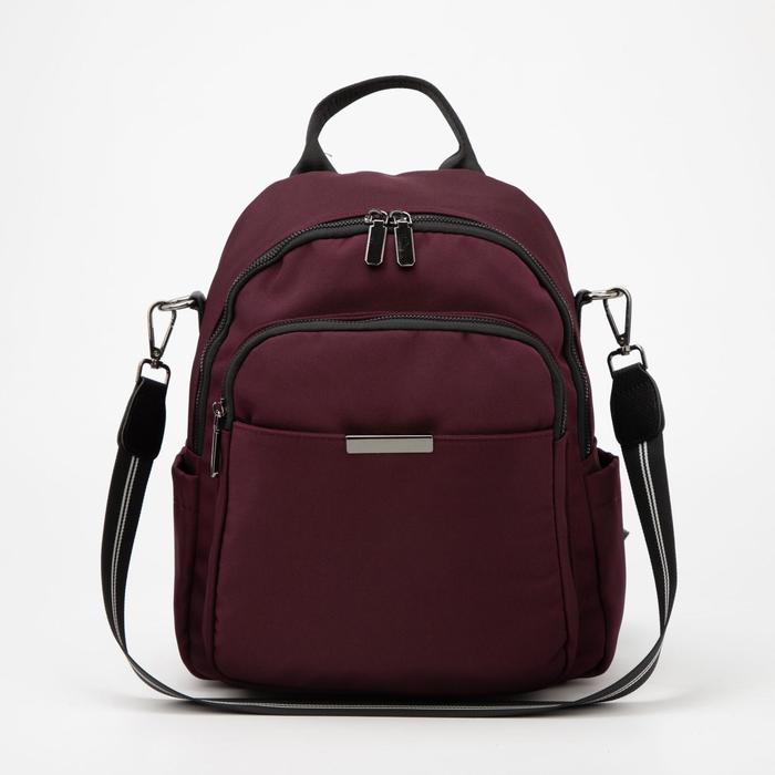 

Рюкзак, отдел на молнии, 3 наружных кармана, 2 боковых кармана, цвет фиолетовый