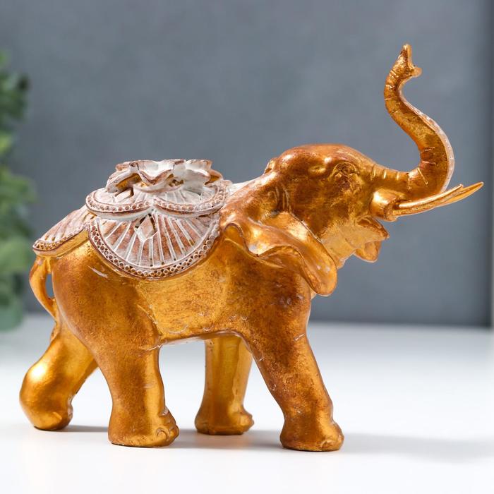 Сувенир полистоун Африканский слон с цветком на попоне под бронзу 12,5х7х14 см