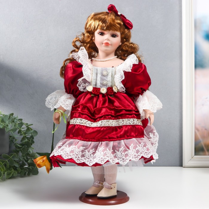 Кукла коллекционная керамика Наташа в бордовом платье с рюшами, с бантом в волосах 40 см кукла коллекционная керамика наташа в бордовом платье с рюшами с бантом в волосах 40 см 1 шт