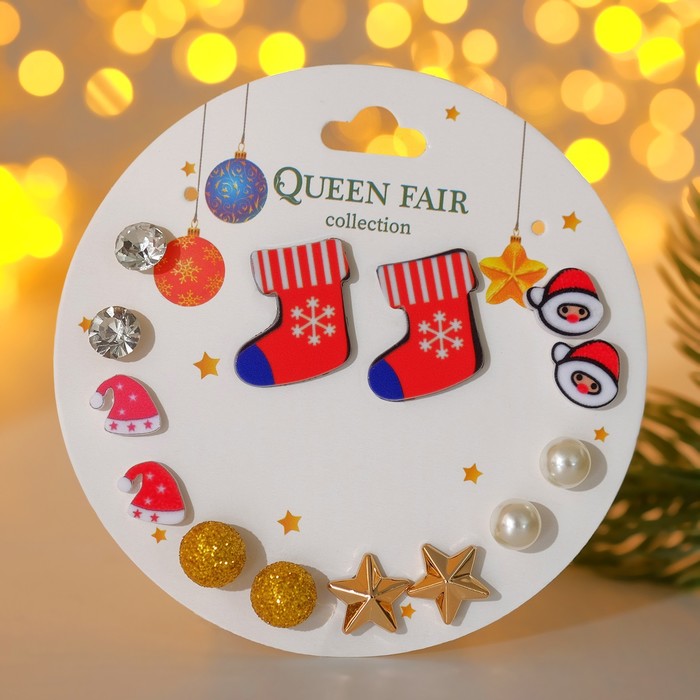 фото Набор серьги 7 пар "новогодние" носки, санта, шапочка, звёзды, красно-белый в золоте queen fair
